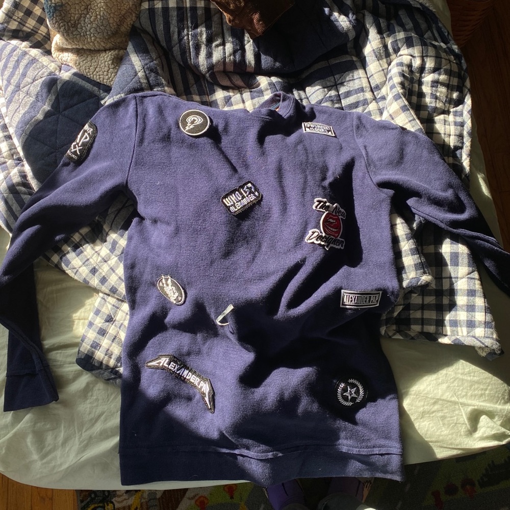 Blue patch sweater